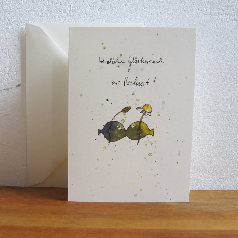 Küssende Fische zur Hochzeit mit Blumen