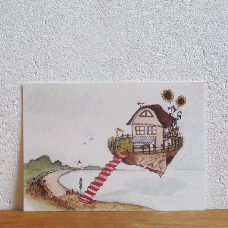 Fliegende Insel mit Reetdachhaus